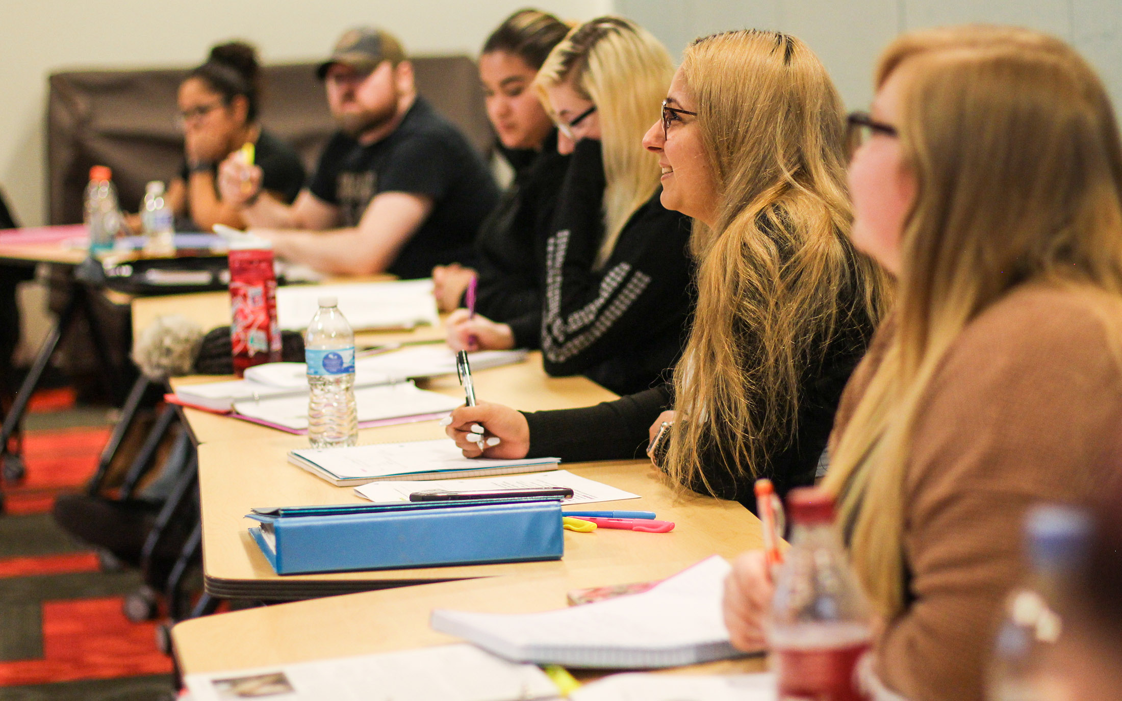 Students in a discussion in a classroom.