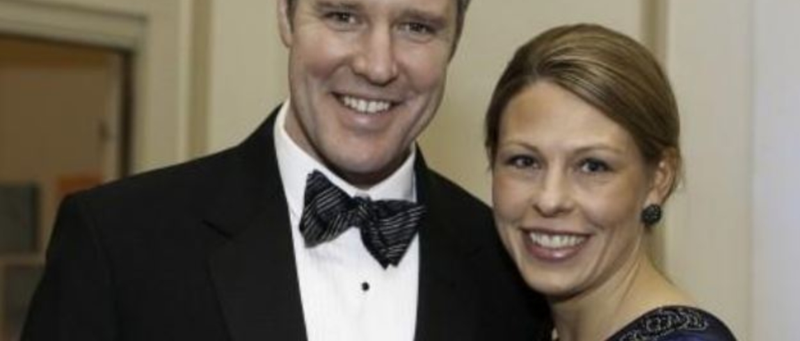 Photo of John and Kristi Proos in formal attire 