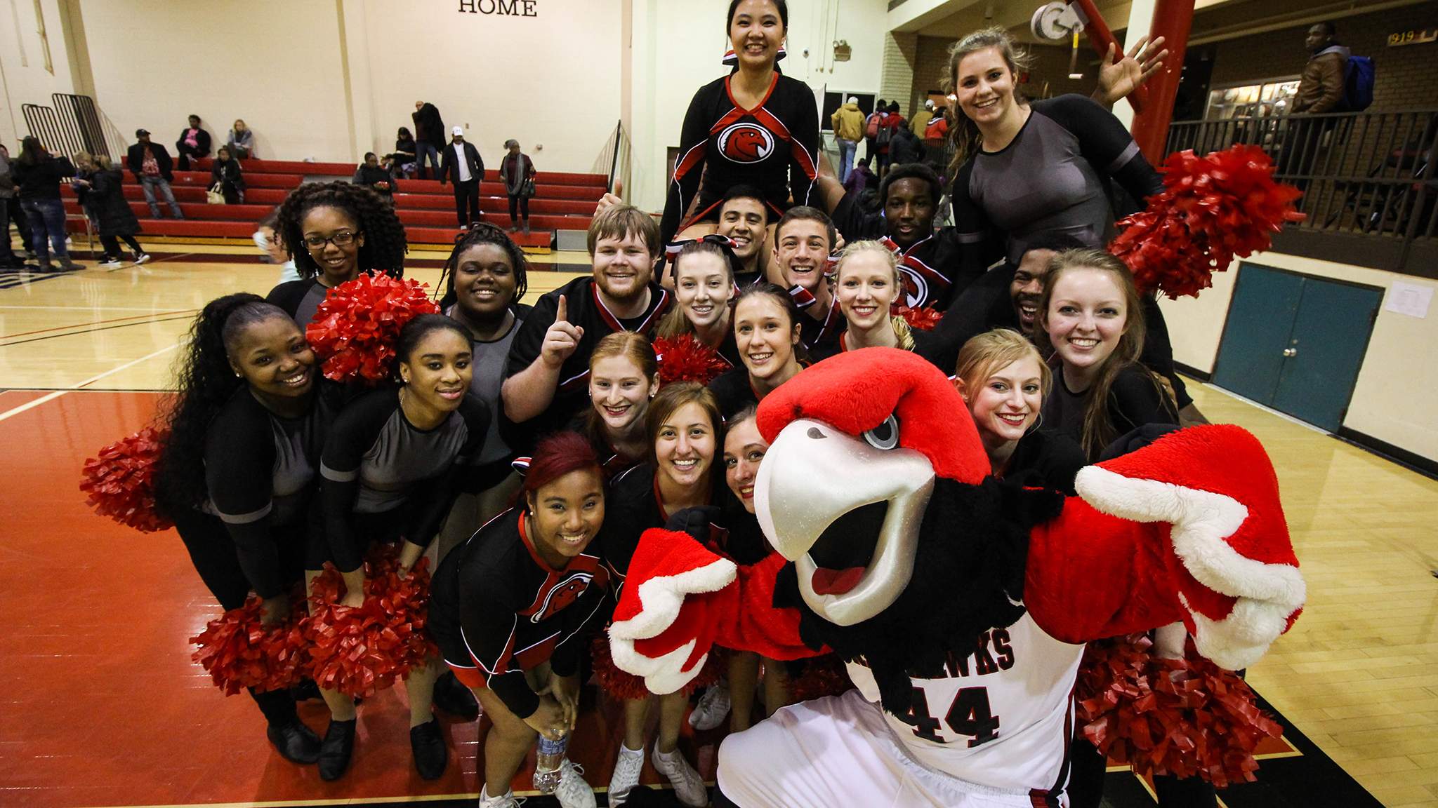Cheer Club and Rocky at Basketball Game
