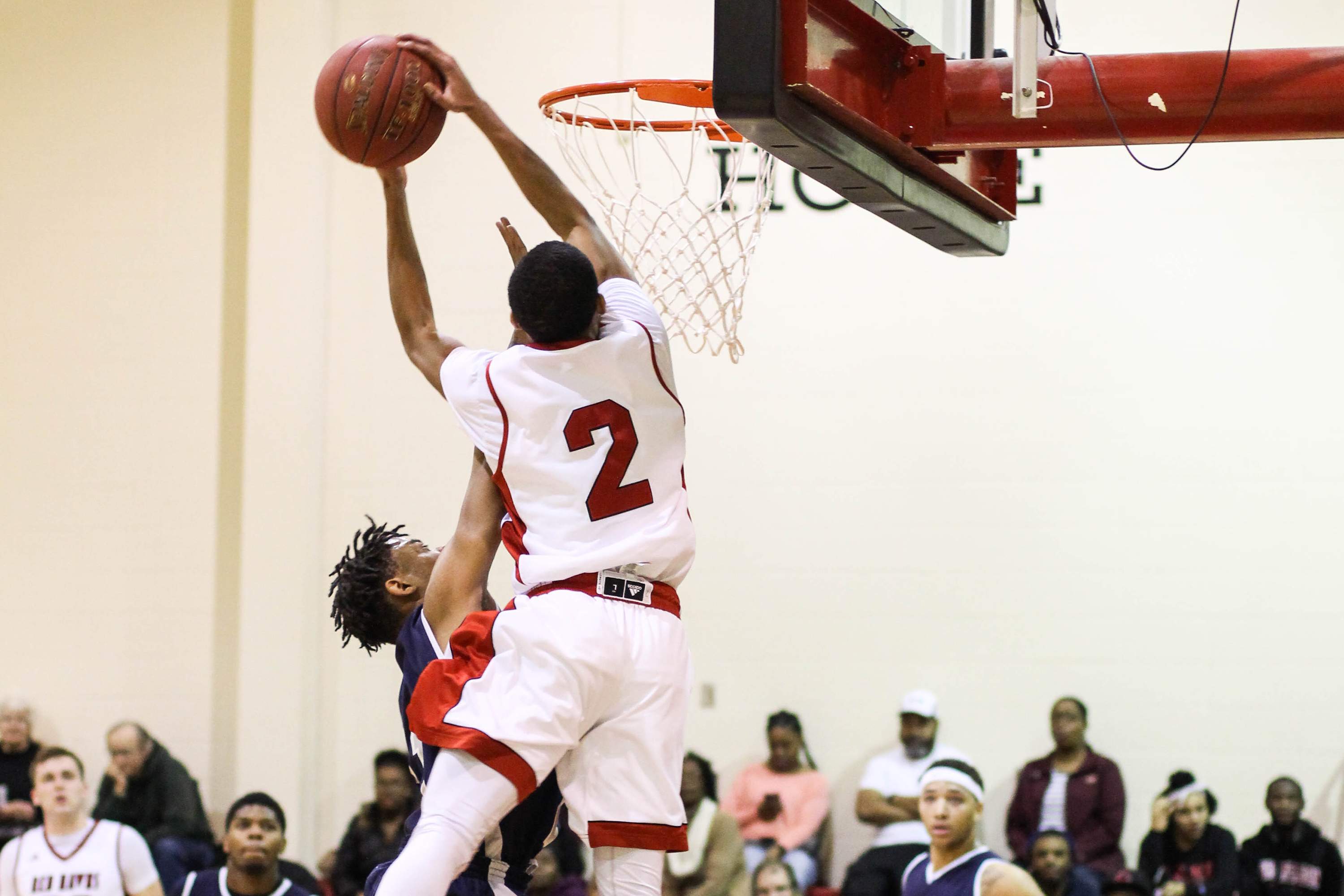 LMC Basketball Player Dunking