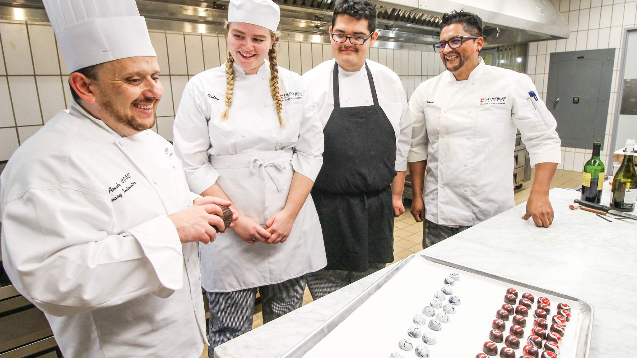 LMC Chef with students in the teaching kitchen