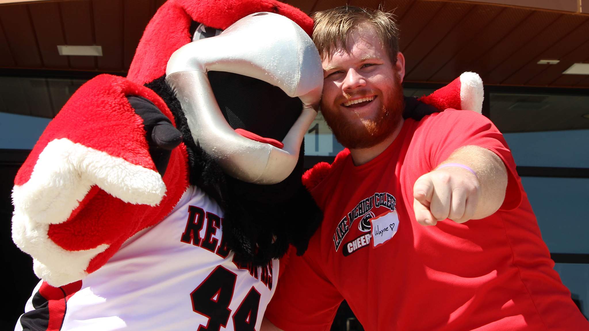 LMC Student with Rocky the Red Hawk