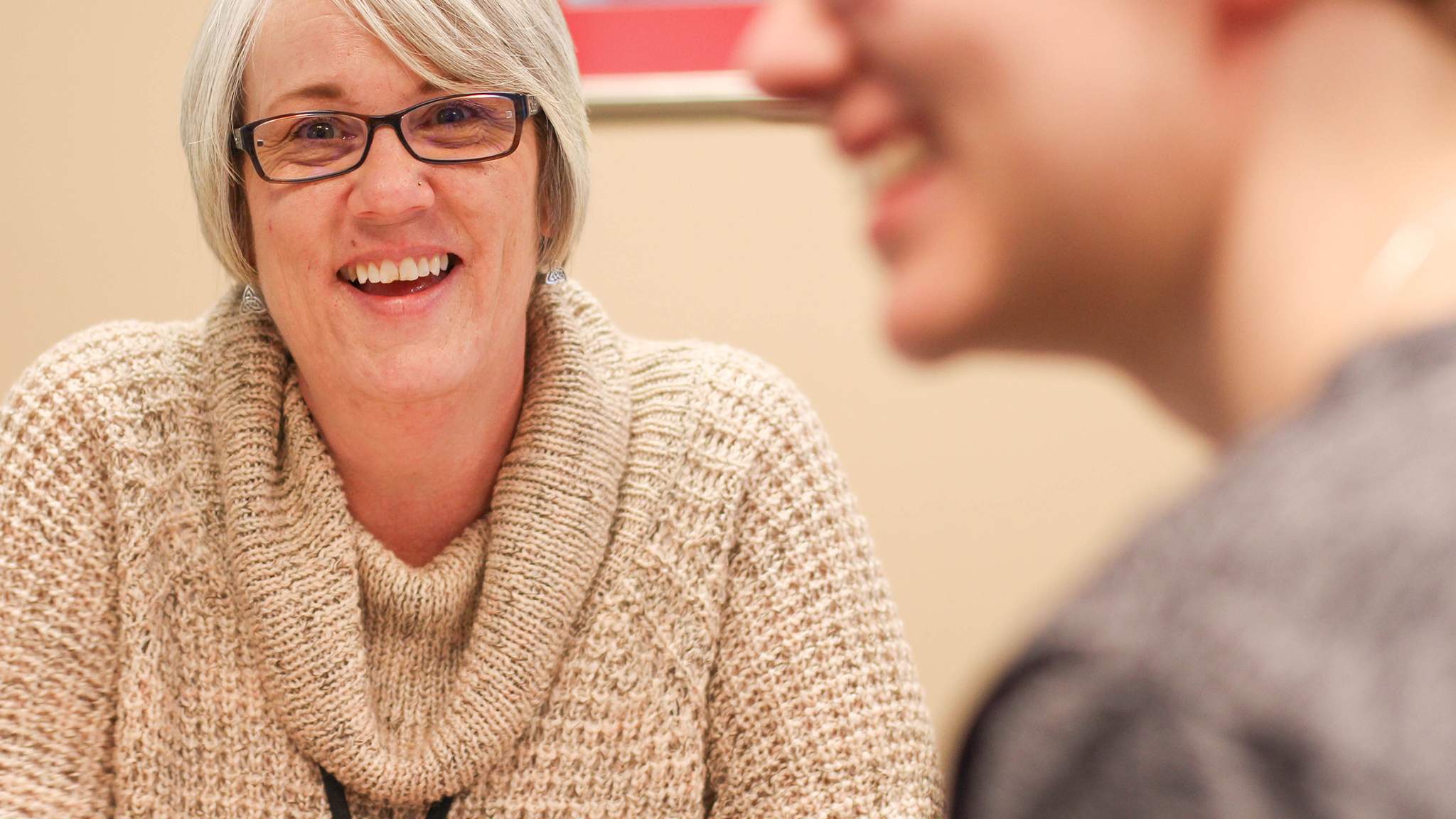 Placement expert assisting a student with assessment