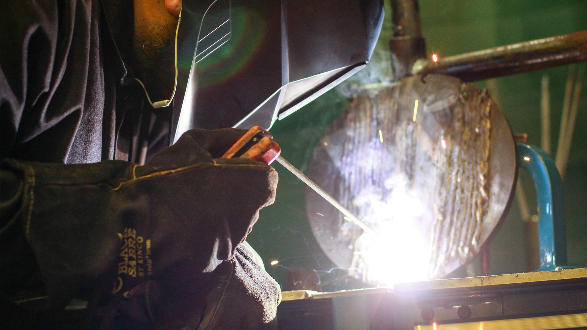 Student Welding in Class