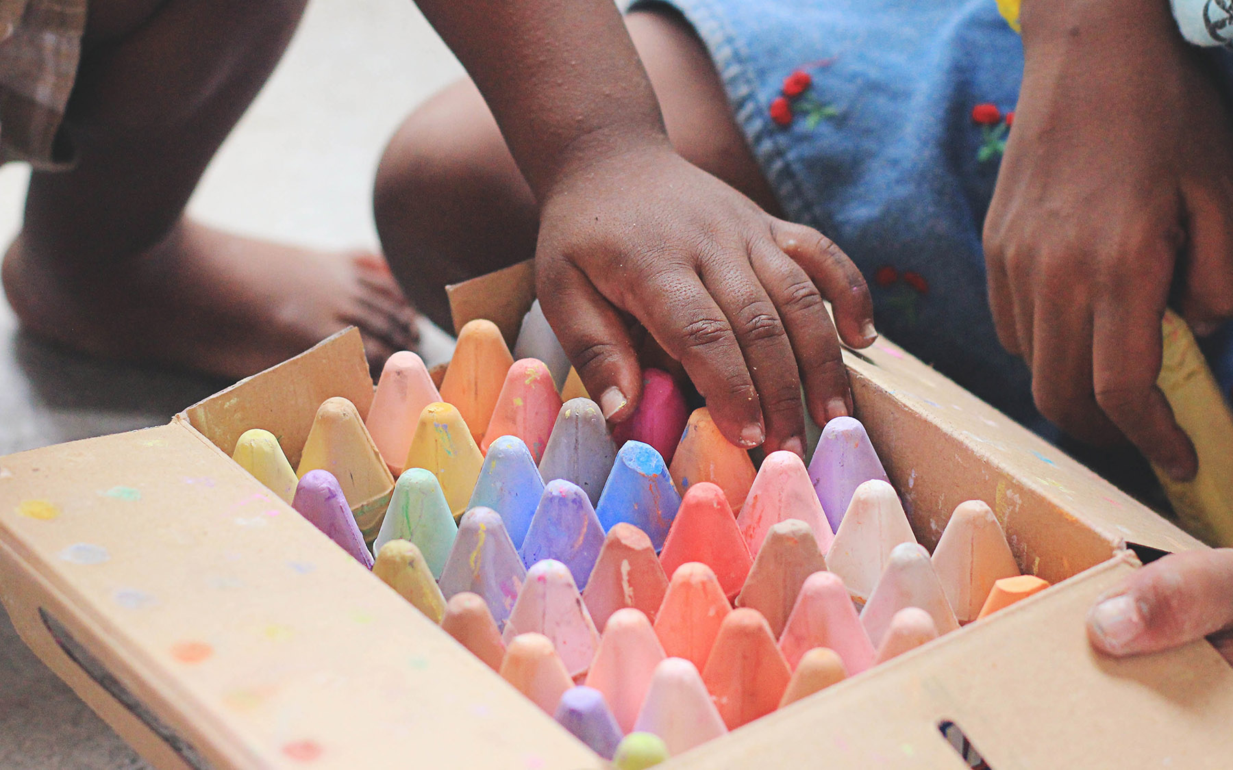 Children playing with chalk