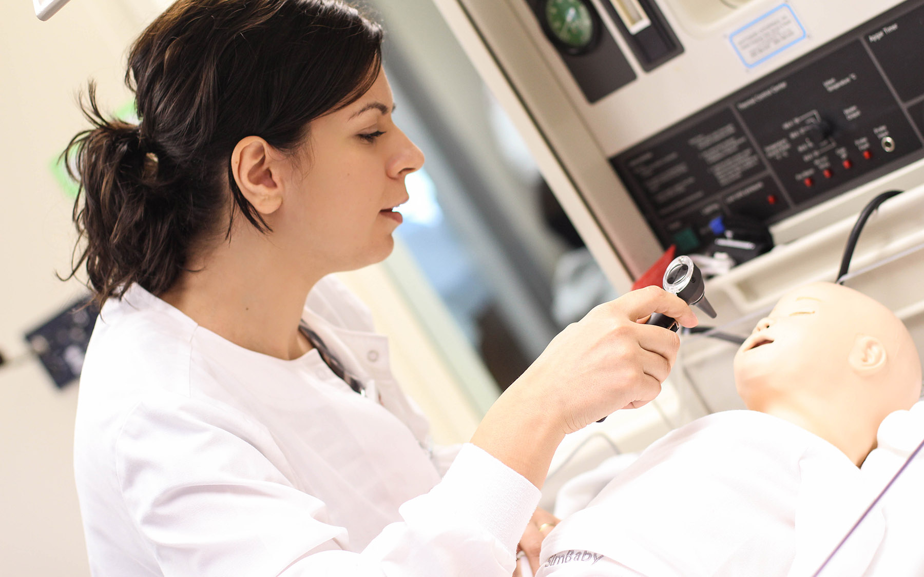 Nursing student working on a mannequin
