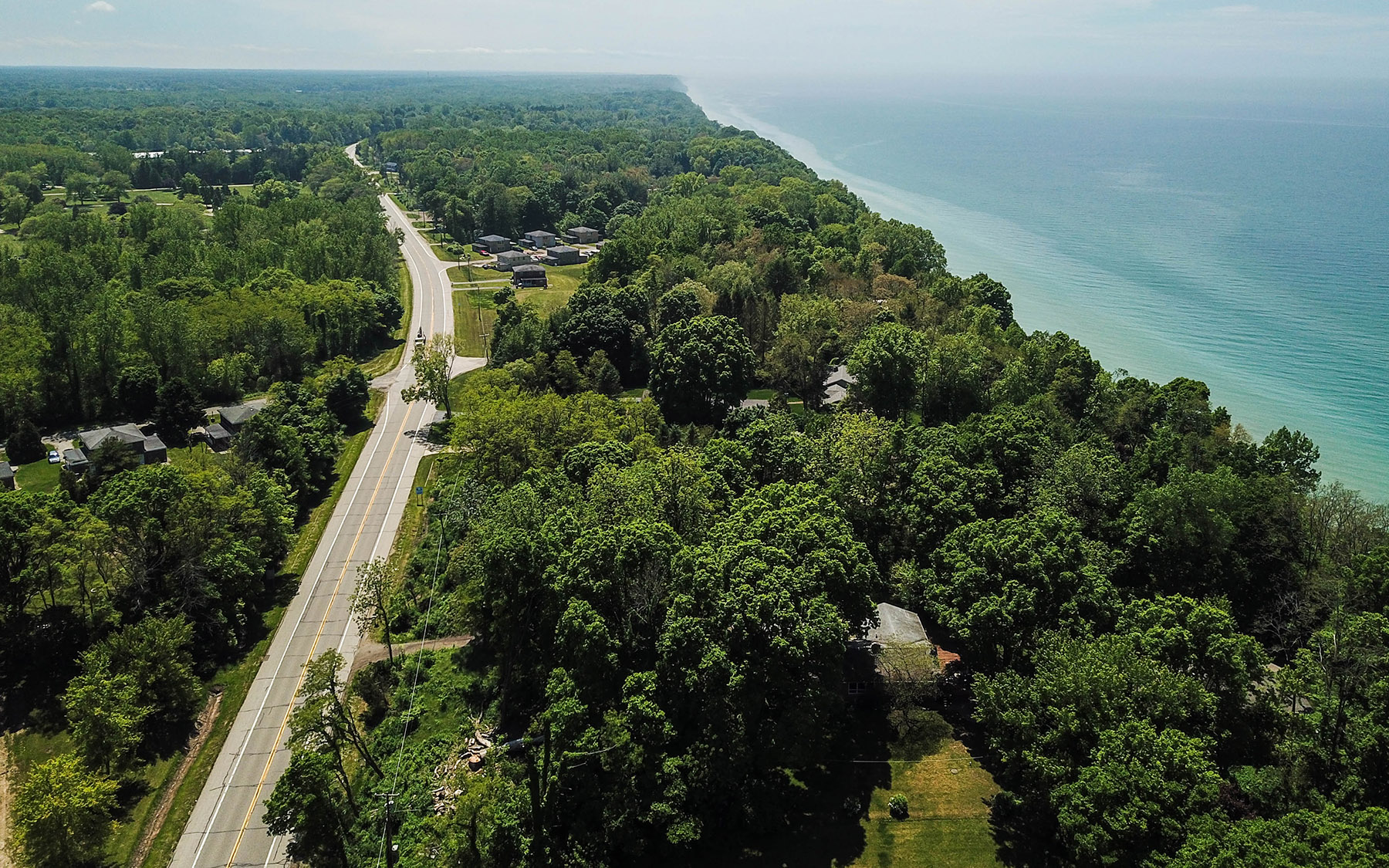 Highway next to Lake Michigan shot from a drone.