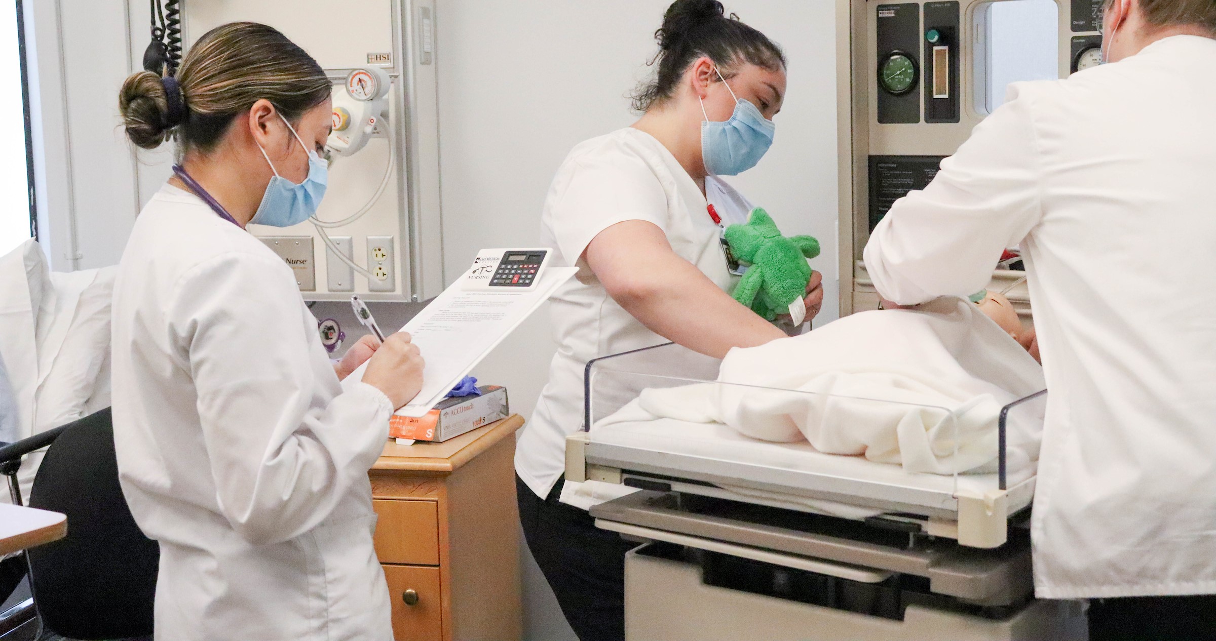 Nursing student in pediatrics lab