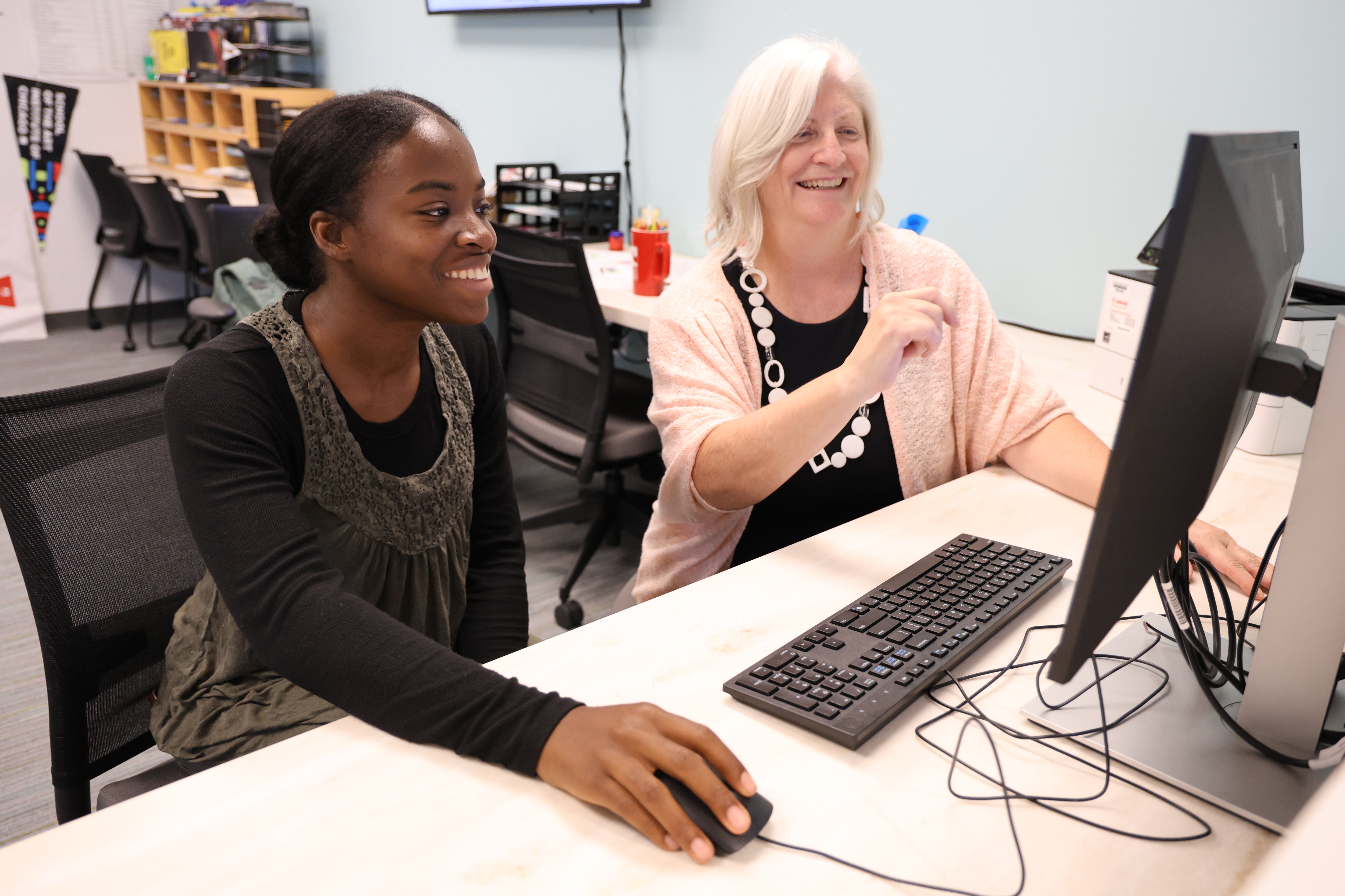 Student and advisor working together