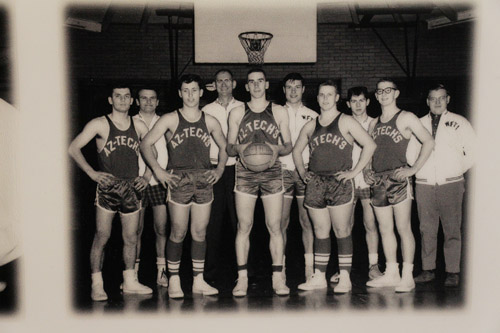 Basketball team poses in their uniforms that read, Az-techs.