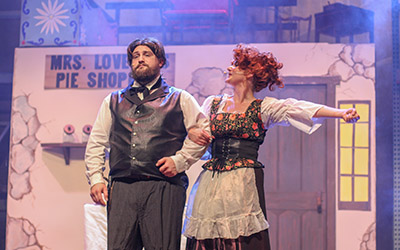 Actors performing Sweeney Todd on the Mendel Mainstage.