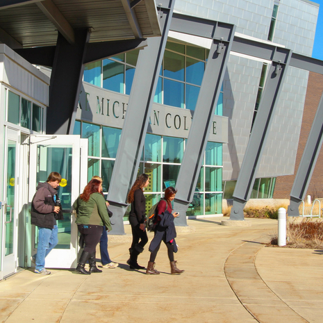Students walking out of the South Haven campus entrance.