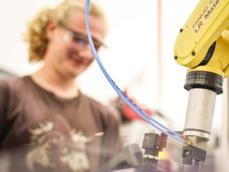 Student working with robotics at the Hanson Technology Center