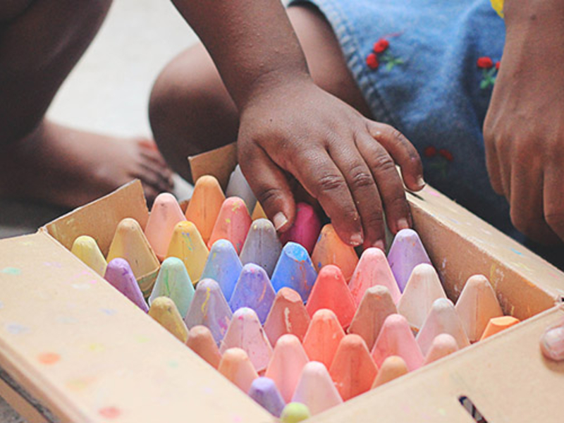 Children playing with chalk