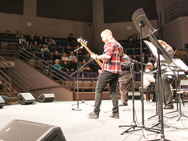 Student performing on stage