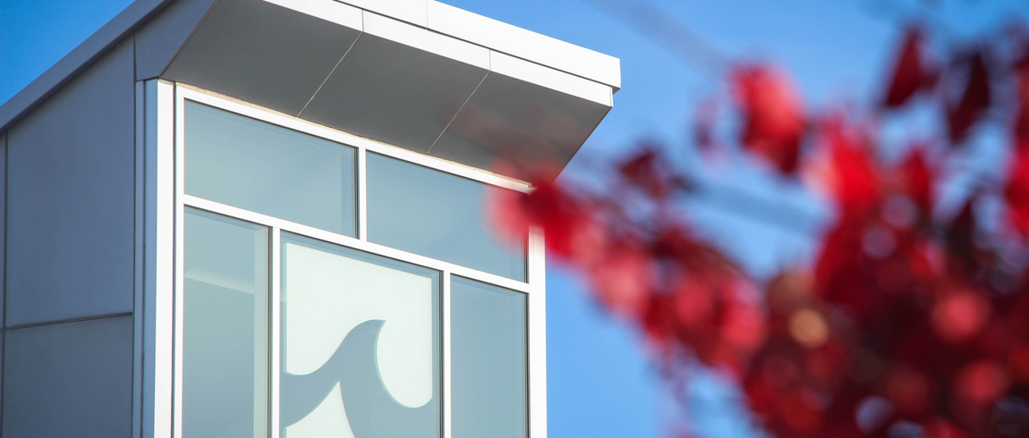 Benton Harbor Campus window Campus building exterior window with wave logo and red branch