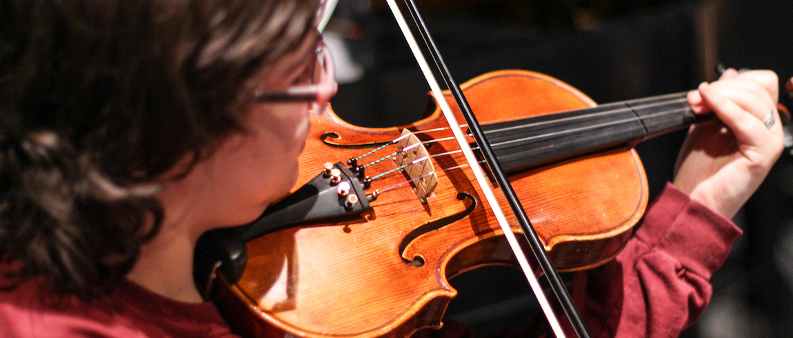 Student playing the violin