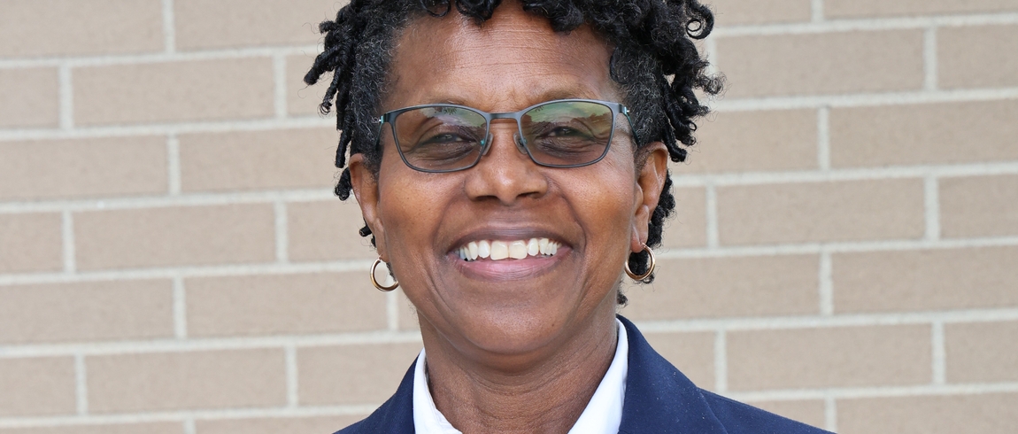 Alloyd Blackmon, glasses, suit jacket