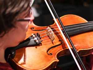 Student playing the violin