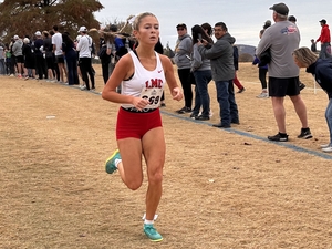 Runner Olivia Ippel running to the finish line