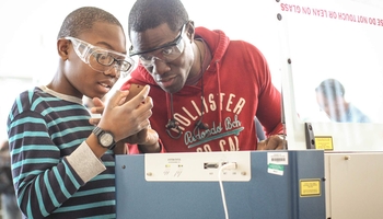 Father and son working together in LMC Fab Lab