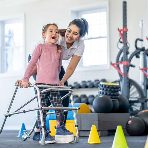 Physical Therapist Assistant with a small child